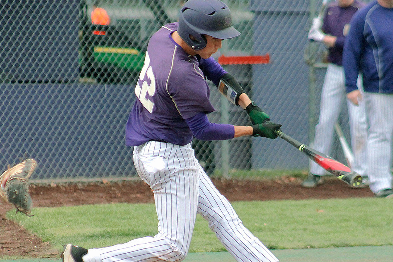 North Kitsap’s Jared Reister makes contact against Port Angeles. (Mark Krulish/Kitsap News Group)