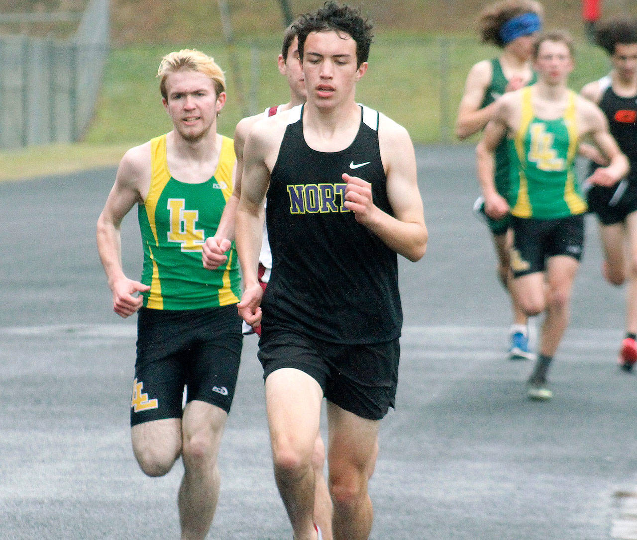 Max Metters of North Kitsap leads the pack in the 1600-meter run. (Mark Krulish/Kitsap News Group)