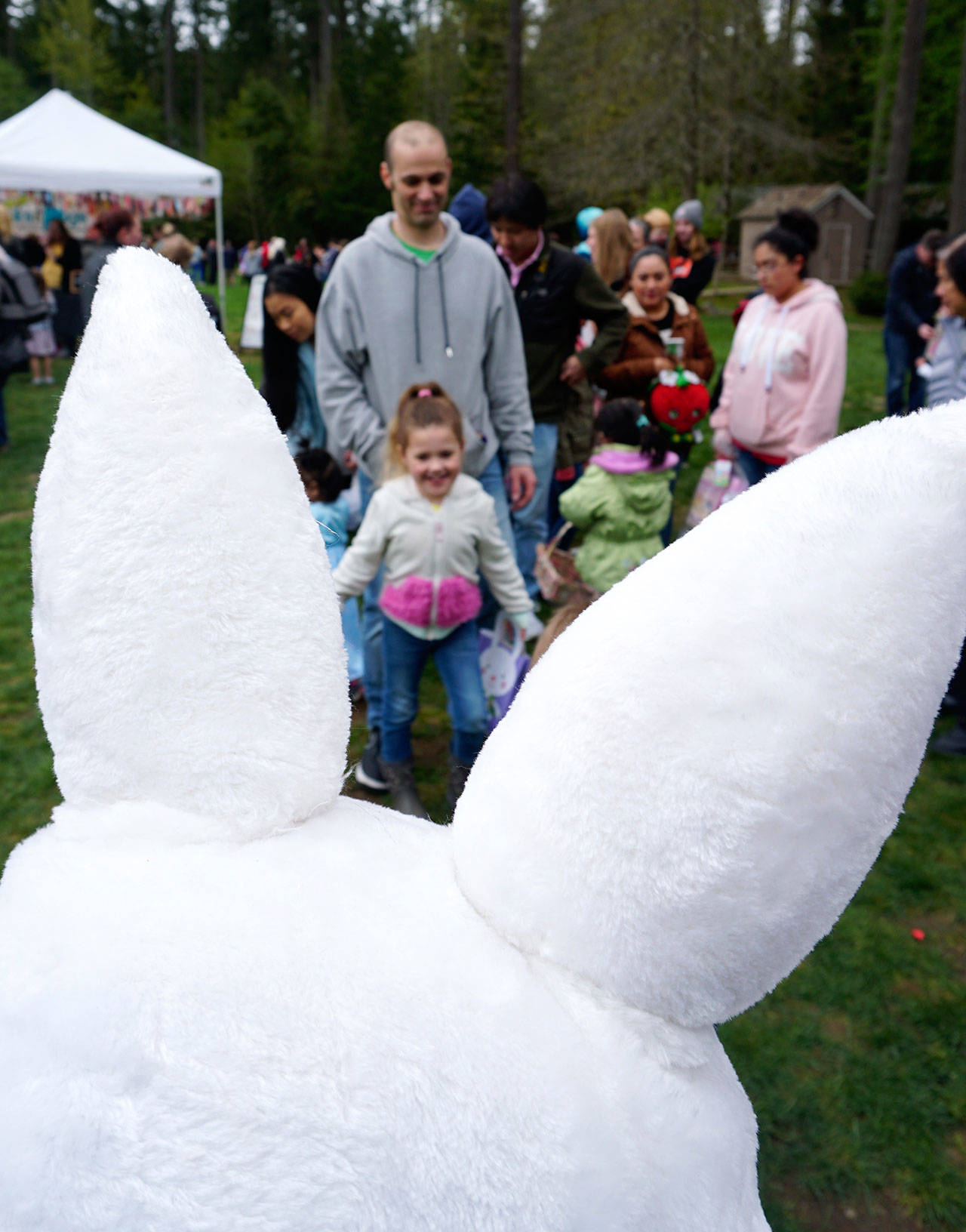 Between the ears: the Easter Bunny awaits the arrival of another young greeter. (Bob Smith | Kitsap Daily News)