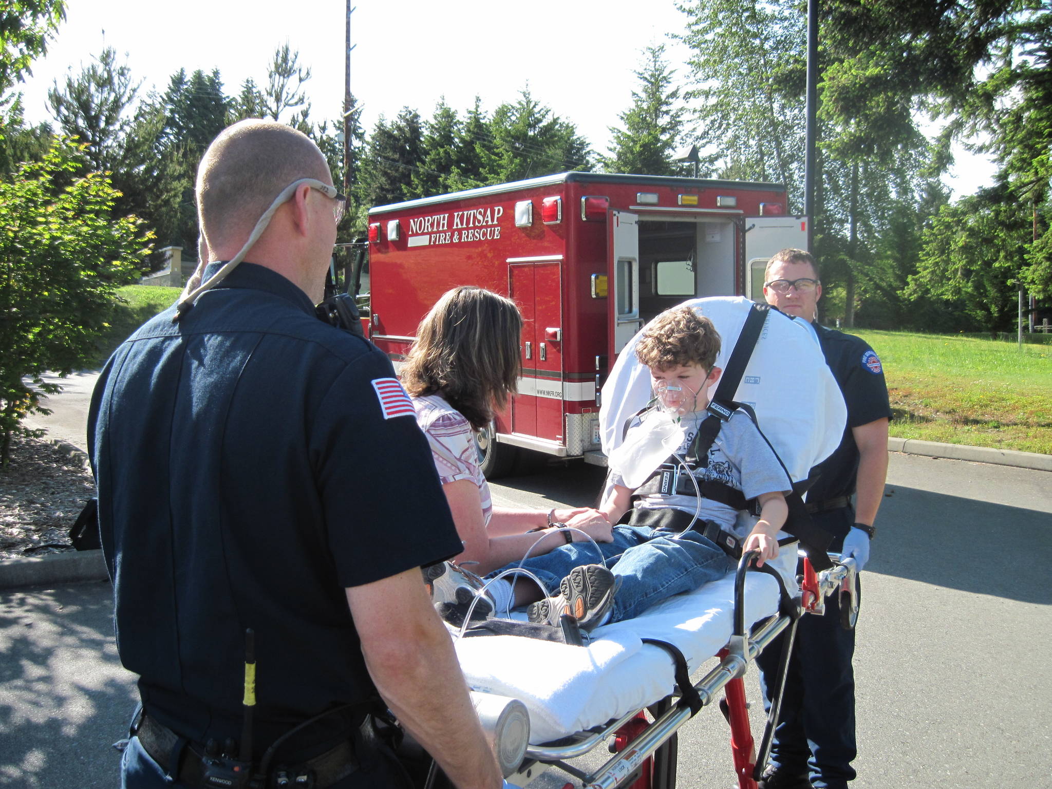 <em>National Emergency Medical Services Week is May 19-25, 2019. All of NKF&R’s response personnel are dual-qualified as firefighters and emergency medical technicians. As shown here, crews regularly train on a variety of situations to ensure that they’re ready for the next emergency call. </em>Photo courtesy North Kitsap Fire & Rescue