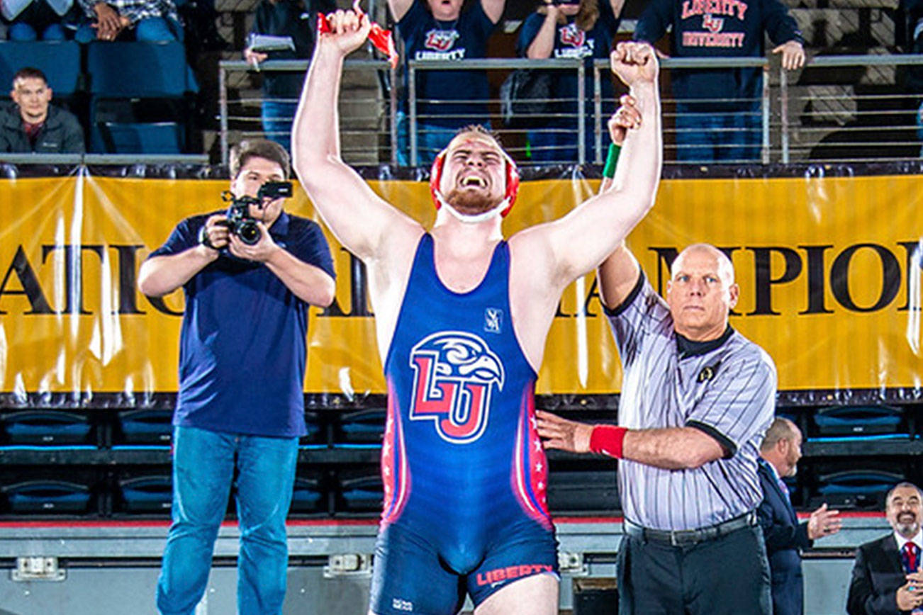 <em>Former Central Kitsap wrestler Dominick Johnson won a national wrestling championship for Liberty University this spring.</em>                                Sam Janicki/contributed