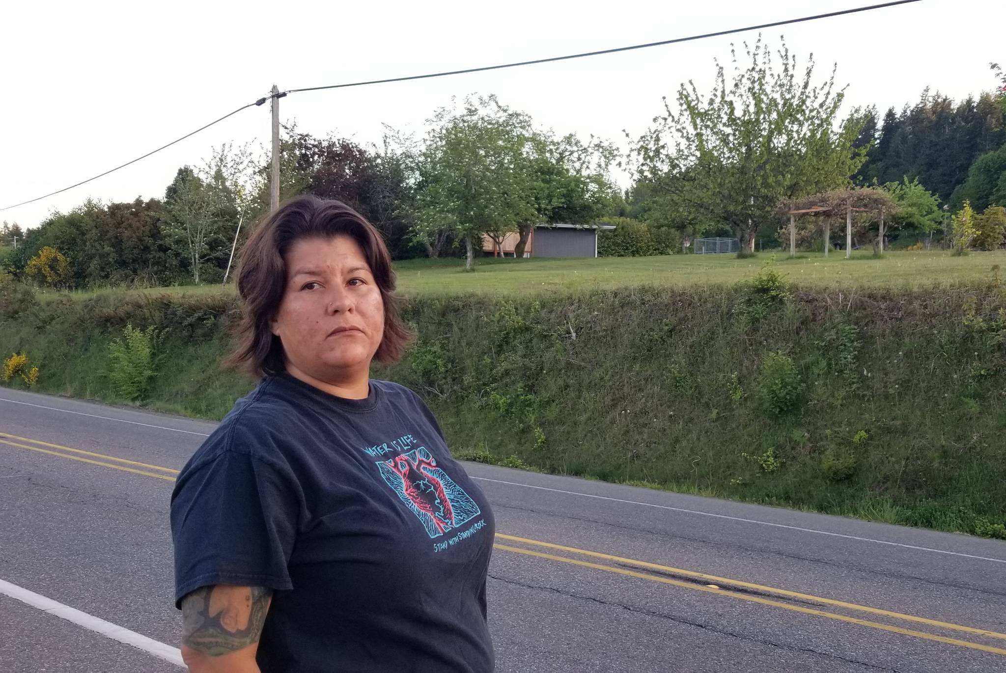 <em>Starr Trujillo stands near her driveway along Viking Way, across from the Poulsbo LRA. </em>Nick Twietmeyer/Kitsap News Group