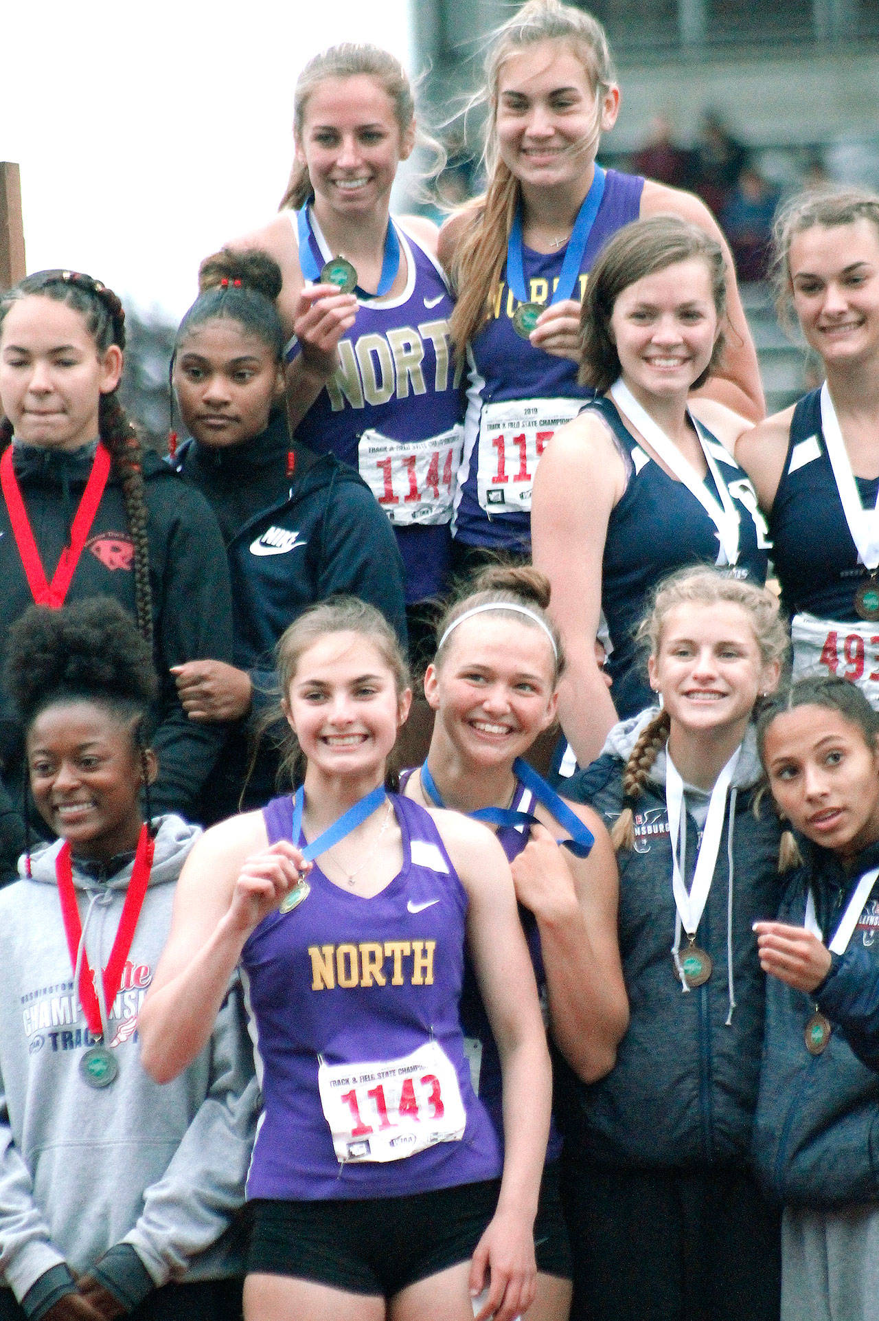 North Kitsap’s 4x200 relay team of Alyssa Cullen, Madeline Pruden, Emerson Bollert and Raelee Moore captured a state title. (Mark Krulish/Kitsap News Group)