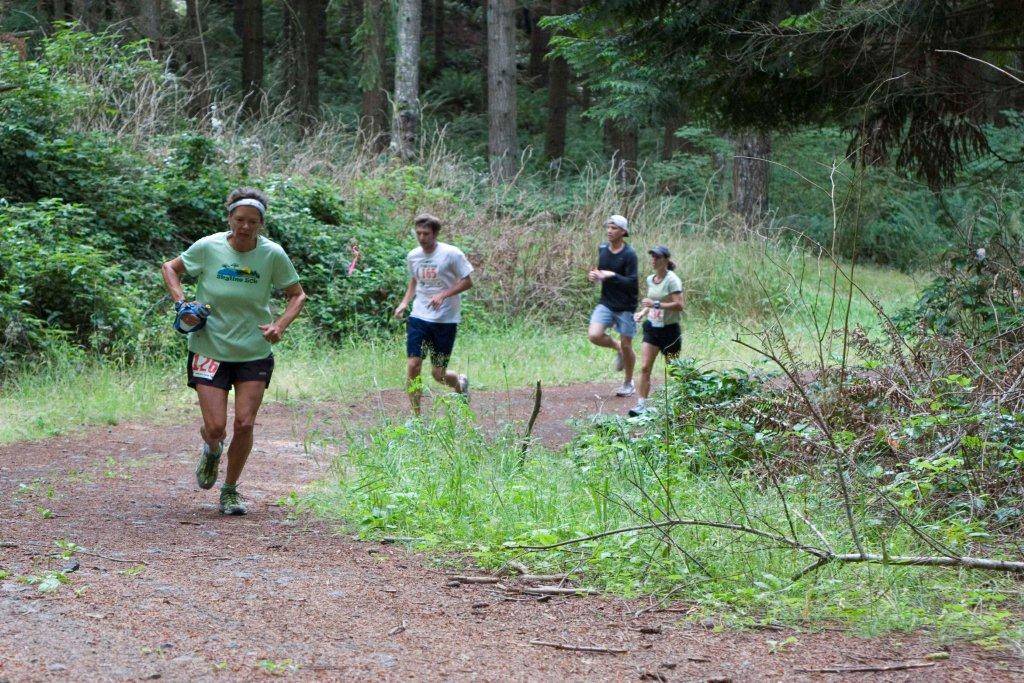 The Lumberjack Run, June 8 - 9 will see participants racing through the trails surrounding Port Gamble during 100-mile, 100-kilometer, and 50-mile endurance races. Photo courtesy Pete Orbea.