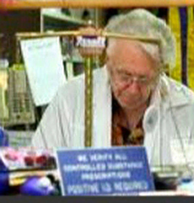 Robert Geiger working in his pharmacy. (Courtesy photo)