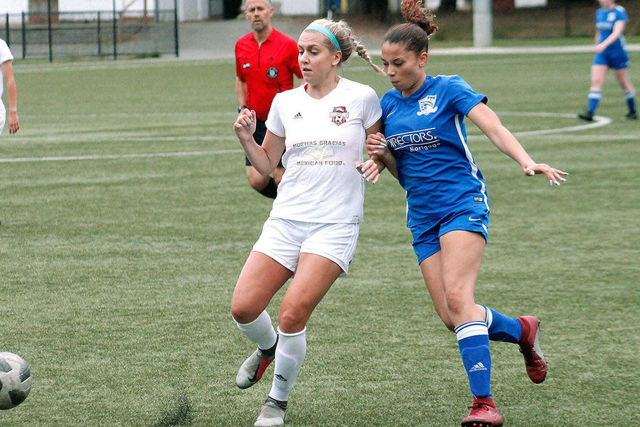 Oly-Pen Force’s Saoirse Brown of Olympic battles for a loose ball. (Mark Krulish/Kitsap News Group)