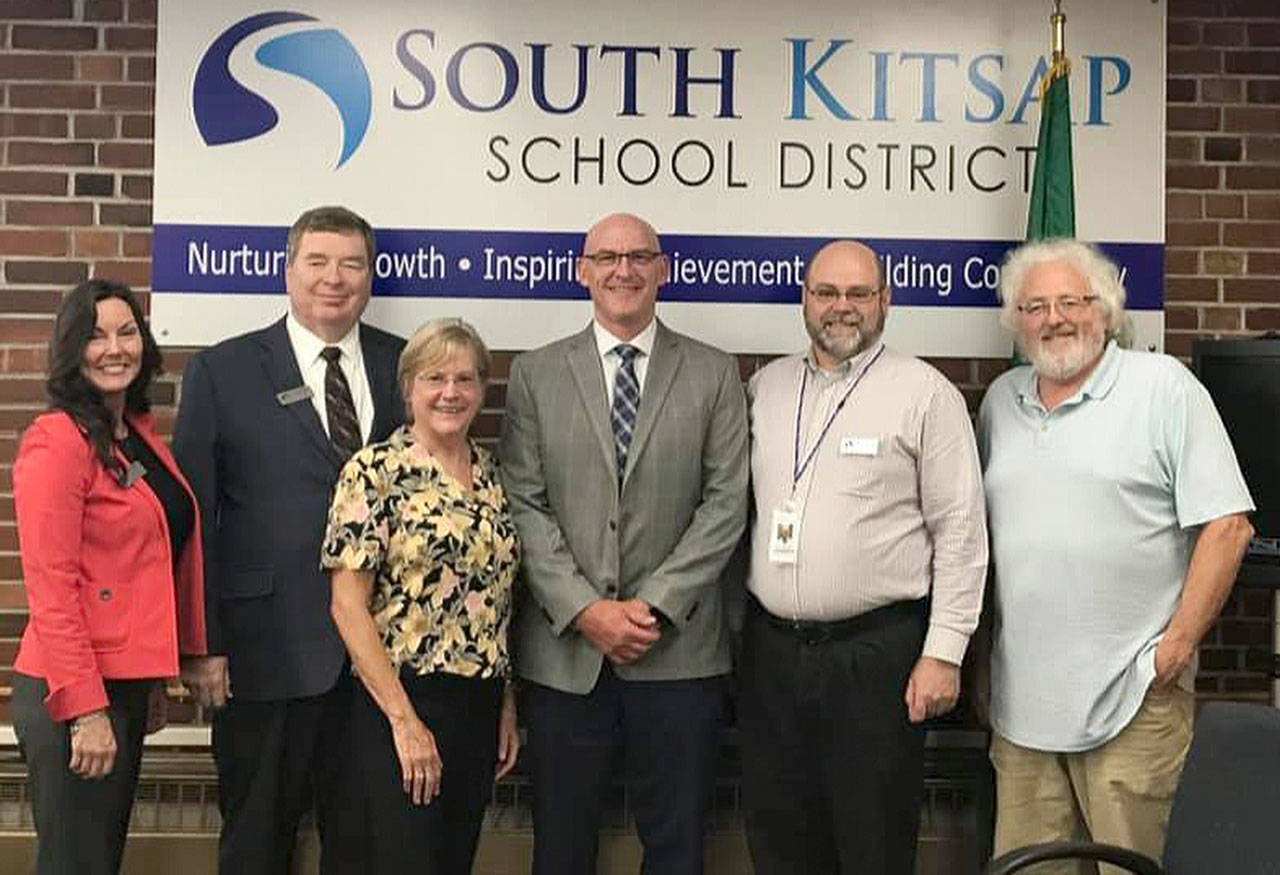 New South Kitsap School District Superintendent Tim Winter joins members of the district’s board of directors: (left to right) Rebecca Diehl, board president; Greg Wall; Liz Sebren; Winter; Eric Gattenby; and Keith Garton. (SKSD photo)