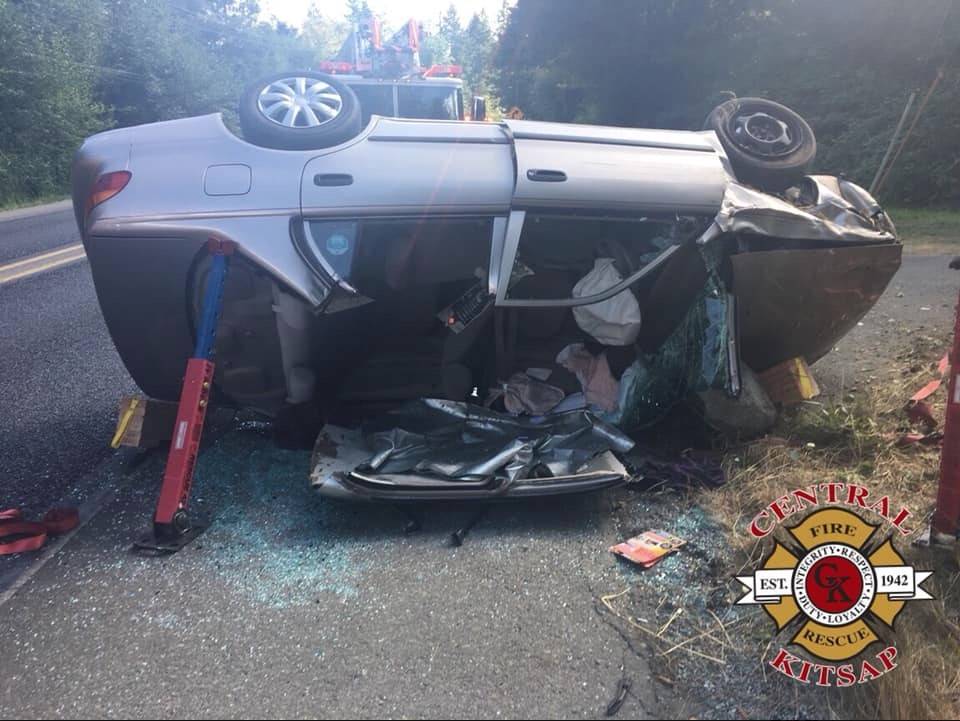 Car roof removed to free entrapped driver from car rollover