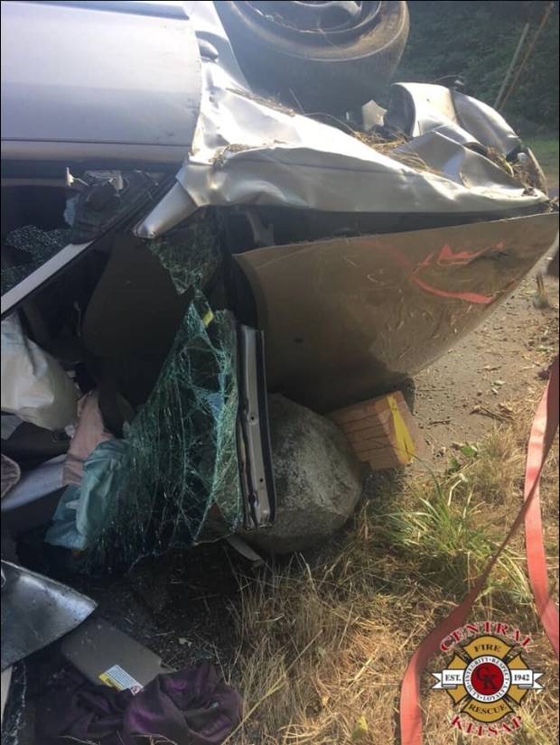 Car roof removed to free entrapped driver from car rollover