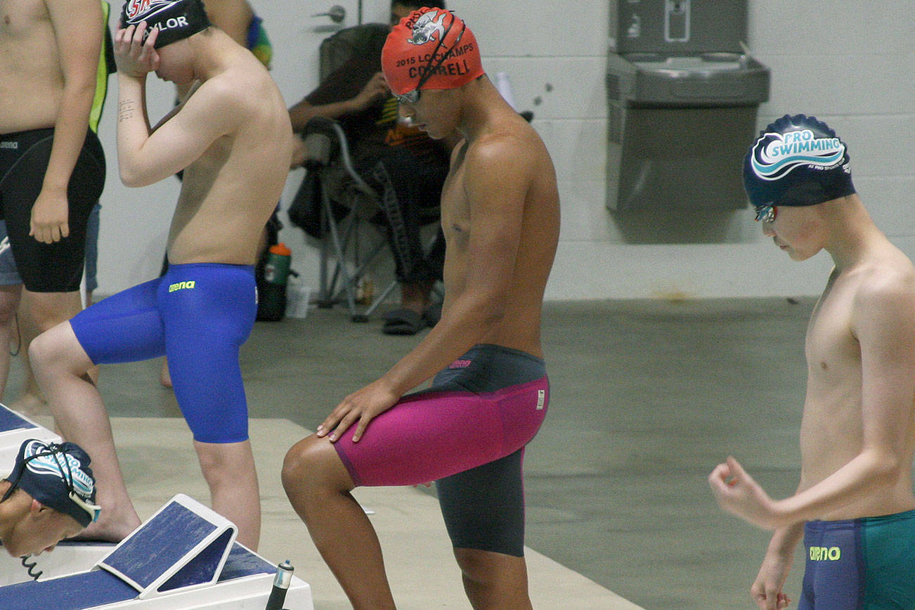 Poulsbo Piranhas swimmer James Correll gets ready at the starting blocks. (Photo courtesy Erika VanHuis)