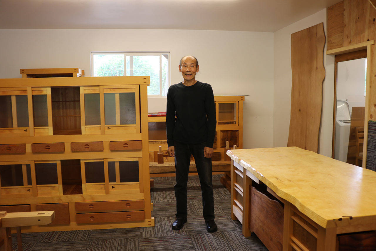 Makoto Imai stands in his Seabeck workshop.
