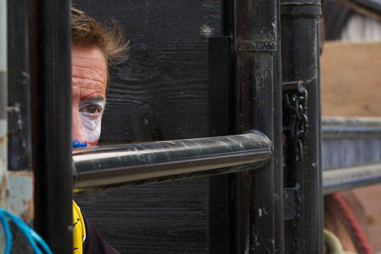 Barrelman Denny Halstead awaits his time to step into the ring. (Photo courtesy Kent Soule - Hoot Creek Photography)