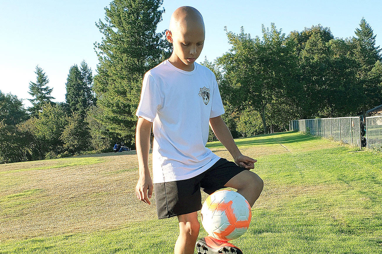 Photo courtesy of David Eyre                                Jesse Eyre, 13, never stopped playing soccer while battling cancer.