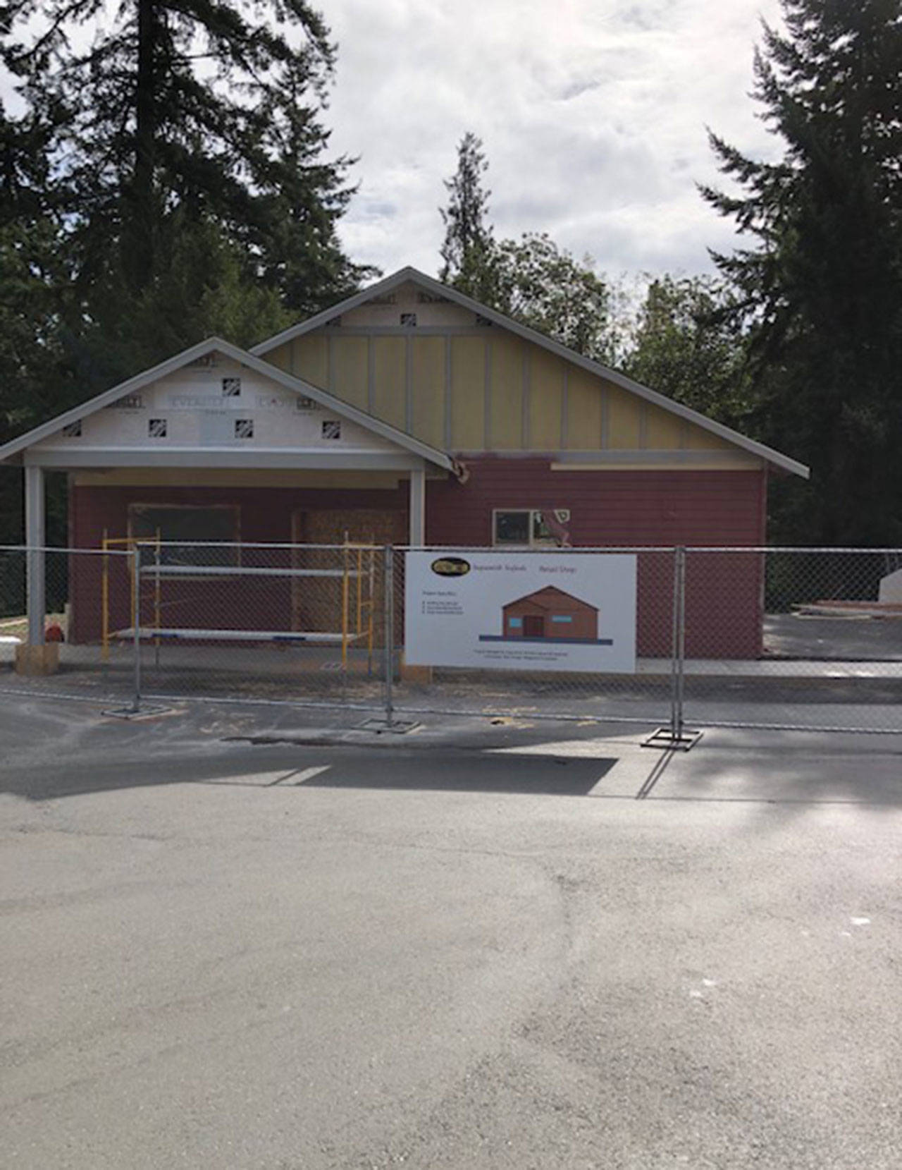 The old liquor store at the Masi Shop gas station in Suquamish is being rebuilt as a seafood retail facility. (photo by Tony Forsman)