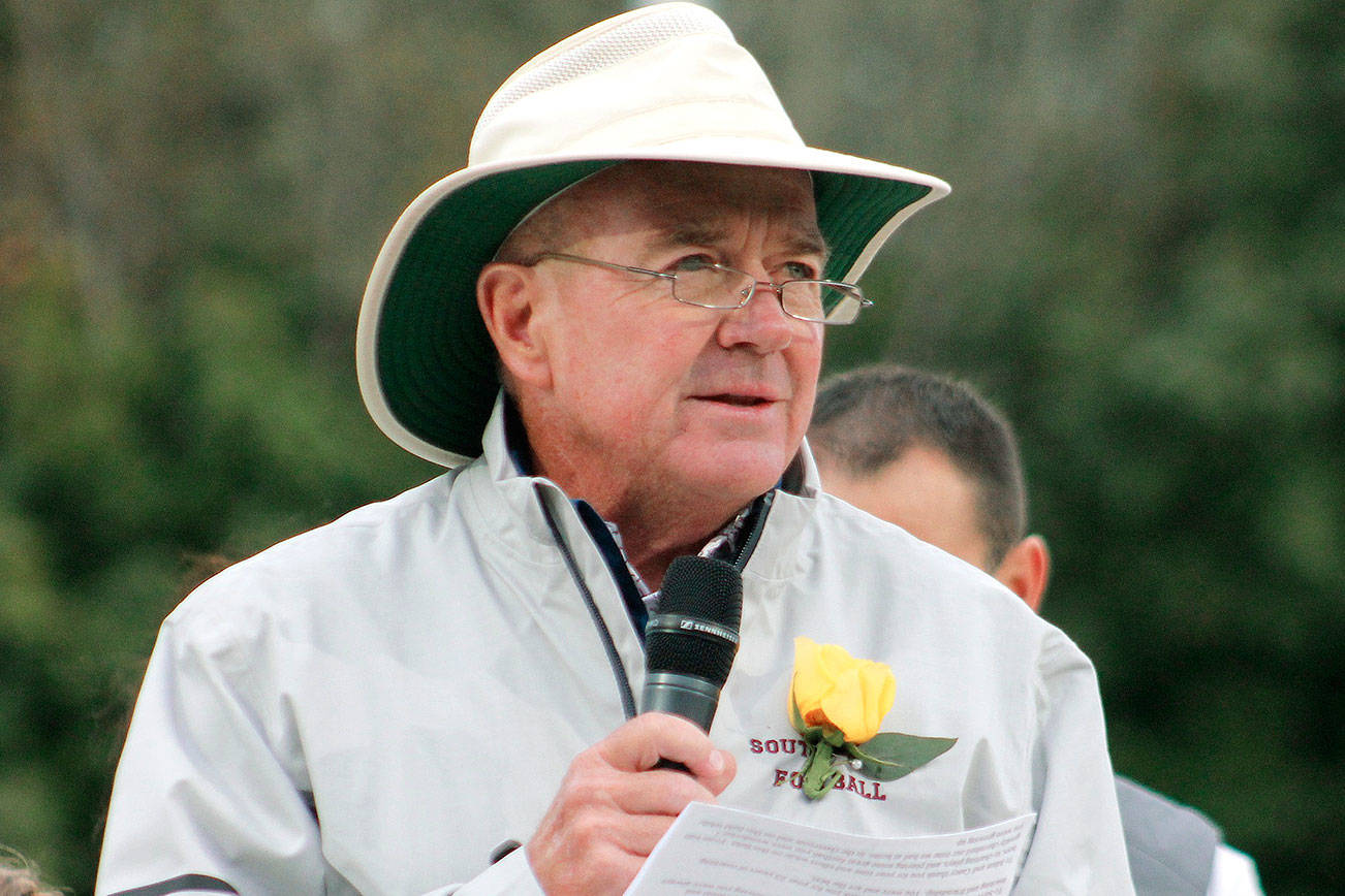 Mark Krulish | Kitsap News Group                                Ed Fisher addresses the big crowd at Kitsap Bank Stadium in a pregame ceremony that renamed the athletic complex in his honor.