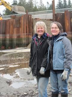Stillwaters founders, Naomi Maasberg and Joleen Palmer, in the estuary on the day the first bridge opened in 2012. Photo courtesy Beth Berglund.