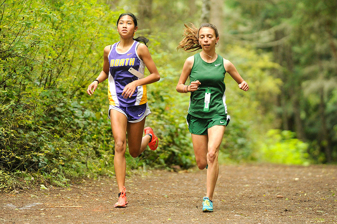 North Kitsap’s Madison Zosa takes an early lead in a league meet against Port Angeles and Sequim. (Michael Dashiell/Sequim Gazette)