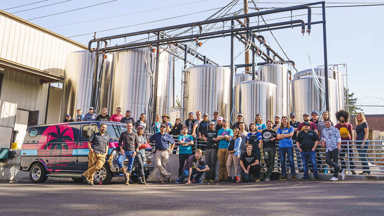 Whole Silver City Brewery crew in front of its new packaging facility at its spot in Bremerton (photo courtesy of Silver City)