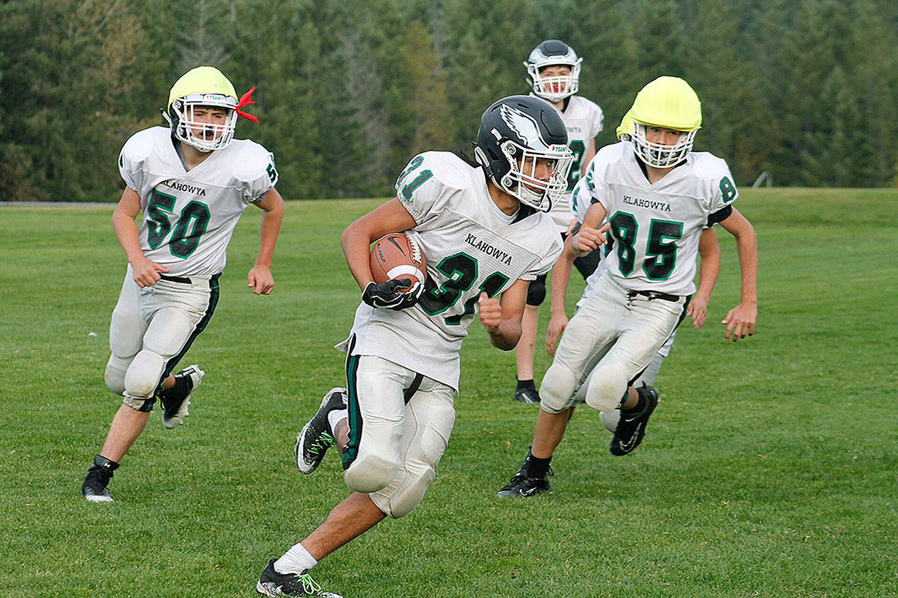 Klahowya’s Max Garvey carries the ball during a recent practice. (Mark Krulish/Kitsap News Group)