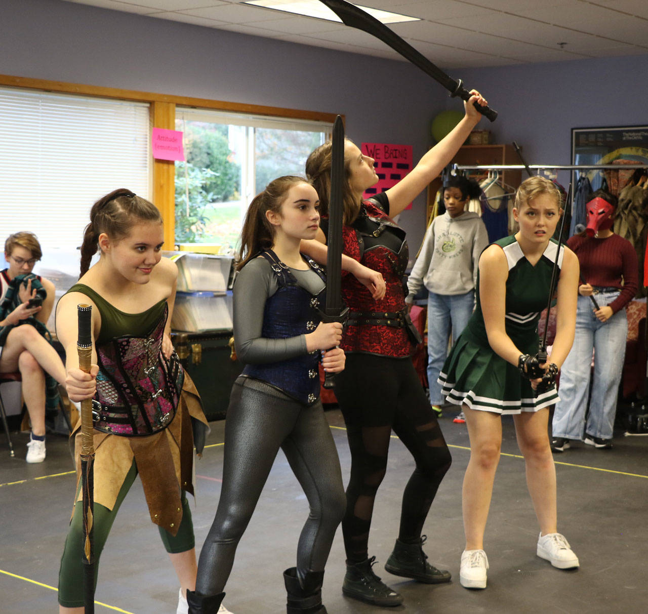 <em>Kaliope (Marin Snelson), Tilly (Esther</em>                                <em>Gleeman), Lillith (Remy Furchtenicht), and Agnes (Grace Schmitt) pose during a rehearsal of “She Kills Monsters.” </em>                                Ken Park/Kitsap News Group