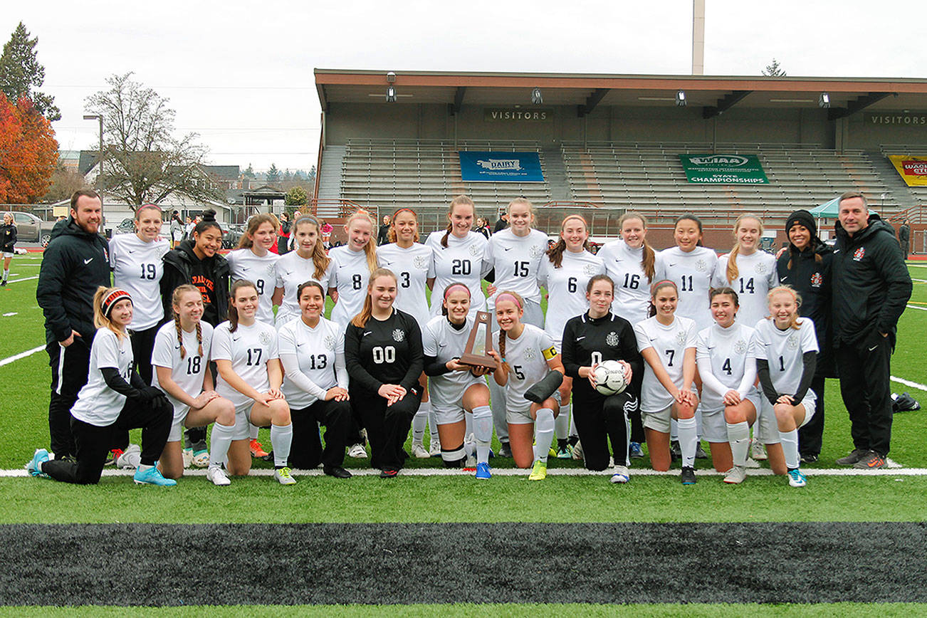 The Central Kitsap Cougars with their third place trophy — their first in program history. They beat Lakeside 1-0 in the third place match. (Mark Krulish/Kitsap News Group)