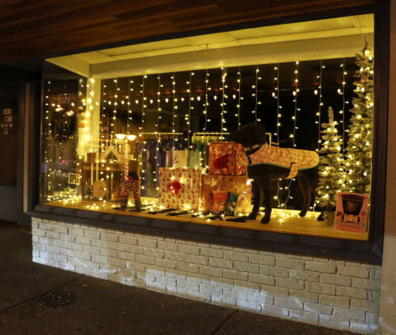 Shops along Front Street have their windows dressed for the holidays.