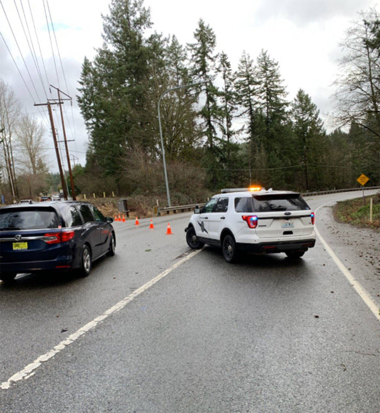 Washington State Troopers helped block off parts of Bond Road due to downed power lines and tree limbs ( photo courtesy of WSP Trooper Chelsea Hodgson).
