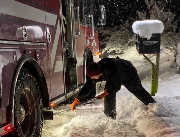 Good Samaritans help free firetruck from snow