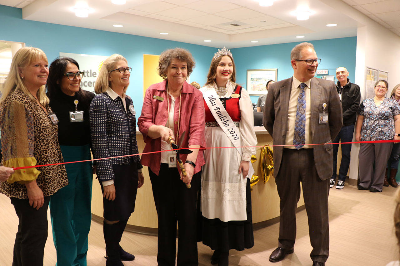 Dr. Berit Madsen, Dr. Faroush Abar, Dr. Jennie Crews, Poulsbo Mayor Becky Erickson, Miss Poulsbo Minako Todd and SCCA Vice President Aaron Crane pose for a photo during a ribbon cutting ceremony for the SCCA’s recently expanded clinic in Poulsbo. Ken Park / Kitsap News Group.                                Dr. Berit Madsen, Dr. Faroush Abar, Dr. Jennie Crews, Poulsbo Mayor Becky Erickson, Miss Poulsbo Minako Todd and SCCA Vice President Aaron Crane pose for a photo during a ribbon cutting ceremony for the SCCA’s recently expanded clinic in Poulsbo. Ken Park / Kitsap News Group.