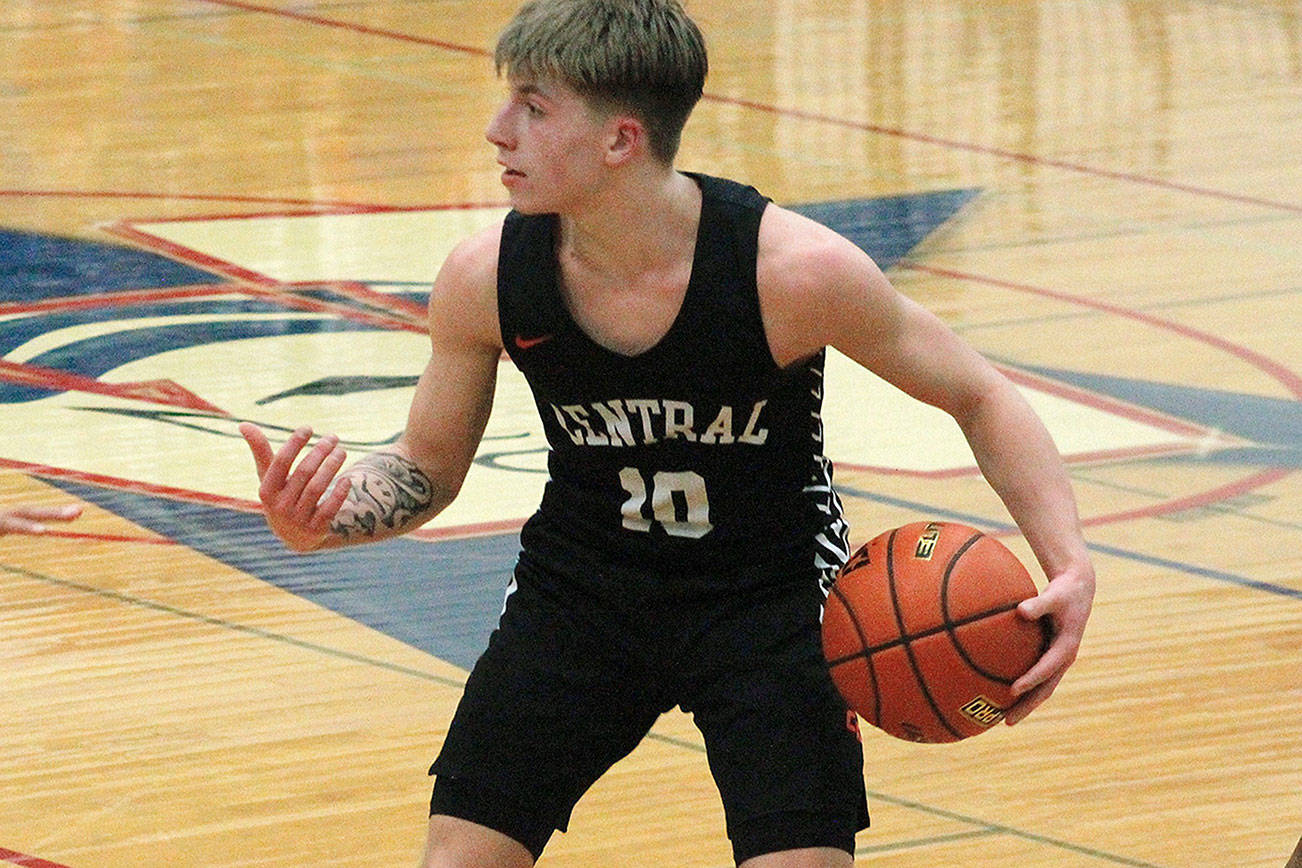 Colby White had a career-high 35 points in Central Kitsap’s regional round win over Shorecrest. The Cougars take on Marysville-Pilchuk at 9 a.m. Wednesday. (Mark Krulish/Kitsap News Group)