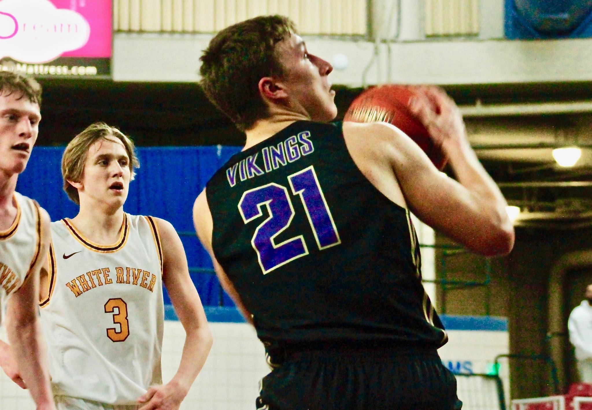 Logan Chmielewski goes up for a basket in North Kitsap’s 64-43 win over White River on Thursday. (Mark Krulish/Kitsap News Group)