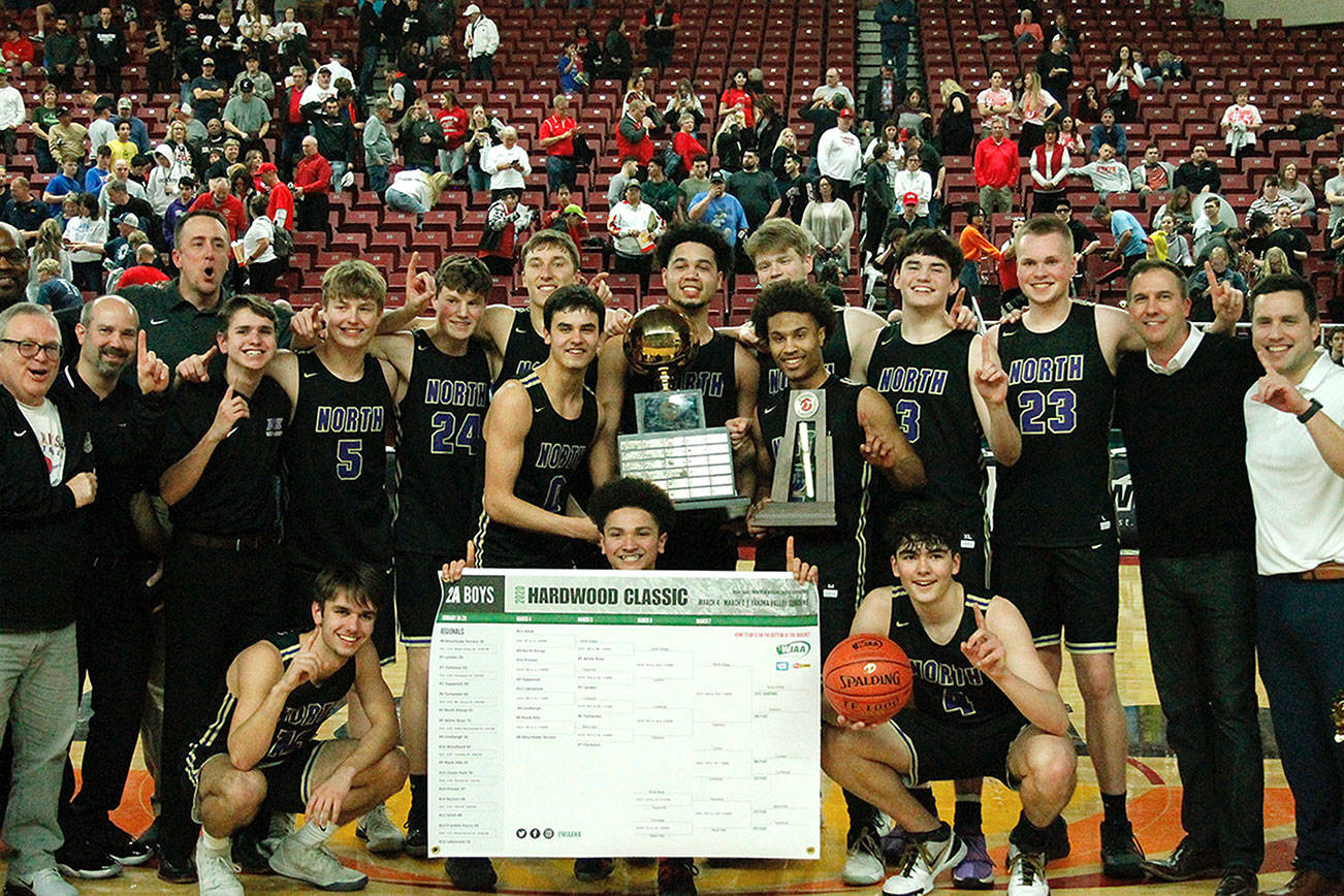 The North Kitsap Vikings are the 2019-2020 2A boys basketball state champions. (Mark Krulish/Kitsap News Group)