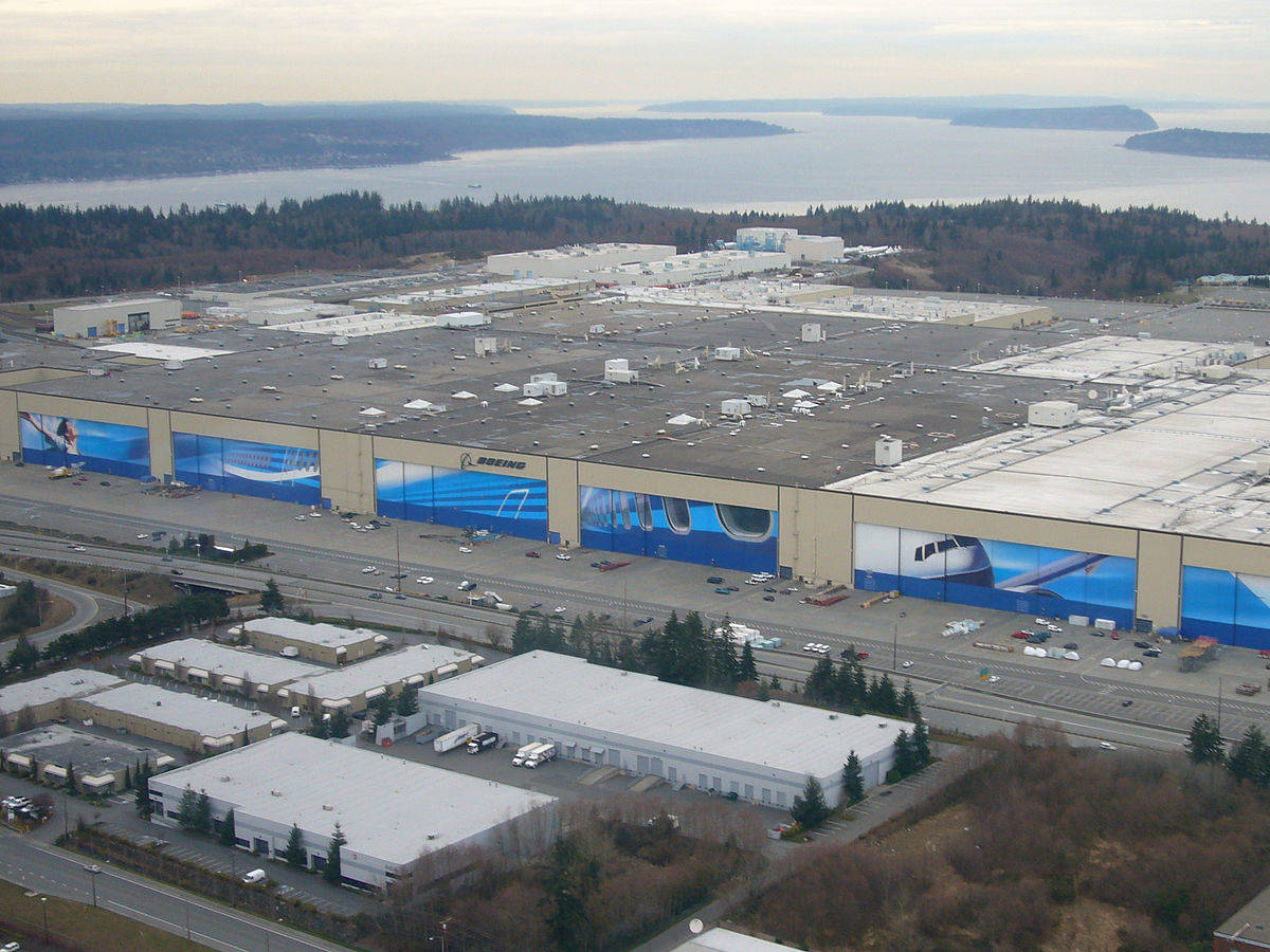 Boeing factory operations across the Puget Sound region (including Everett, pictured here) will be suspended on Wednesday due to the coronavirus pandemic. A Boeing worker was reported Sunday to have died from the virus. (File photo)