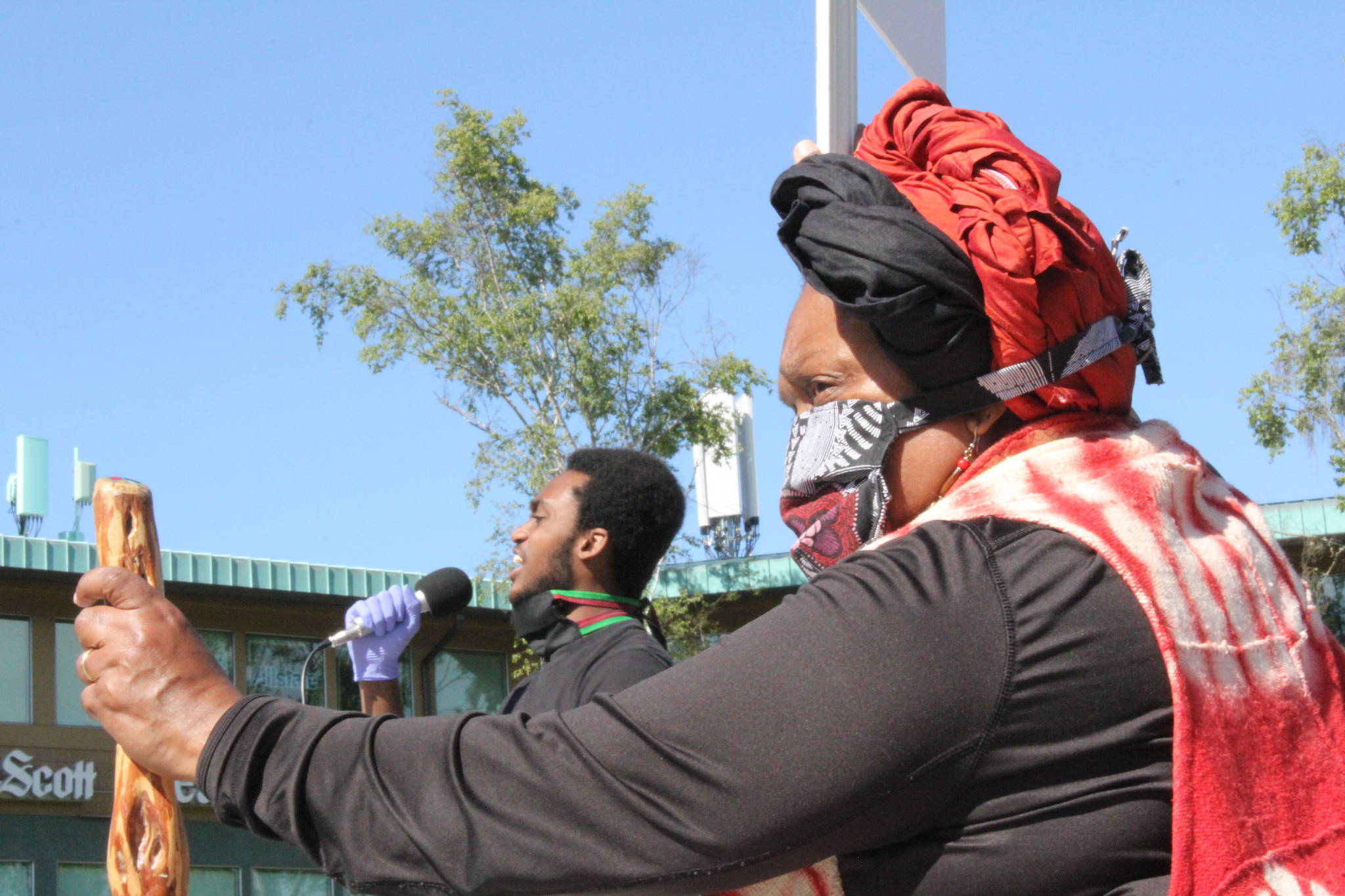 Karen Vargas of the Kitsap ERACE coalition looks on as protesters recite the names of men and women who have been killed in interactions with police officers. Photo by Nick Twietmeyer                                Karen Vargas of the Kitsap ERACE coalition looks on as protesters recite the names of men and women who have been killed in interactions with police officers. Photo by Nick Twietmeyer