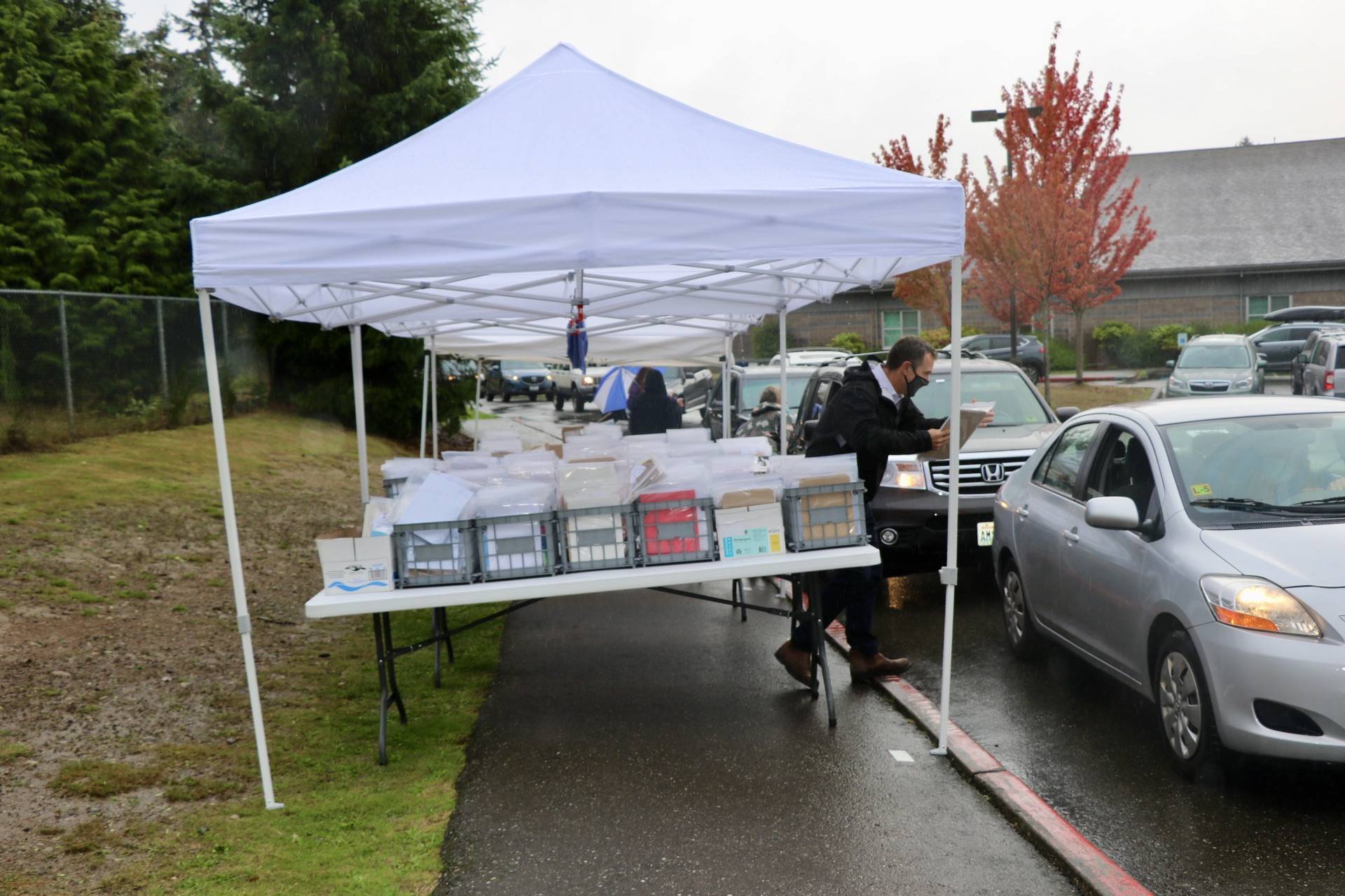 Families drive through to pick up materials, meals in BI