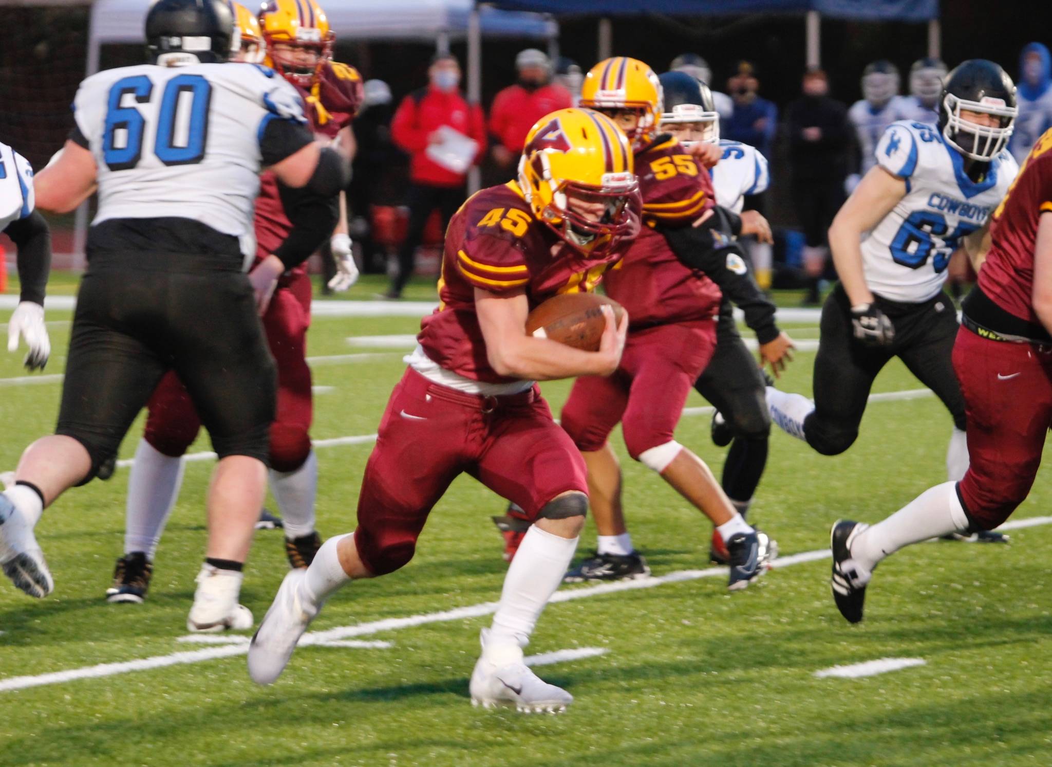 Kingston running back Sam Reber breaks through the East Jefferson defense. Reber led the Bucs in rushing in their 12-7 victory. (Mark Krulish/Kitsap News Group)