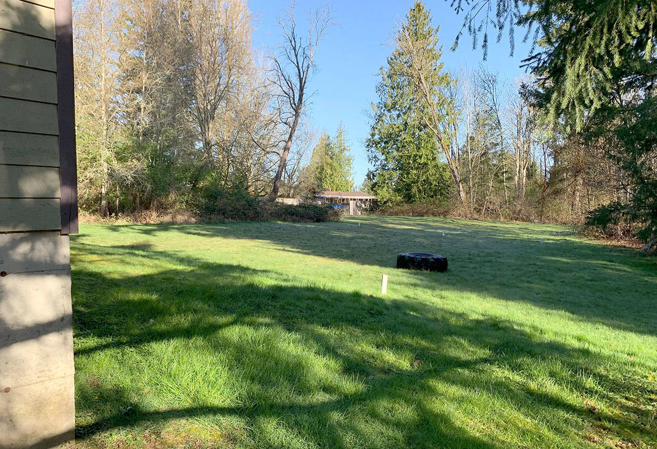 A large grassy area outside is one benefit for those living in the large 25,000 square foot facility. (Mike De Felice | Kitsap Daily News)