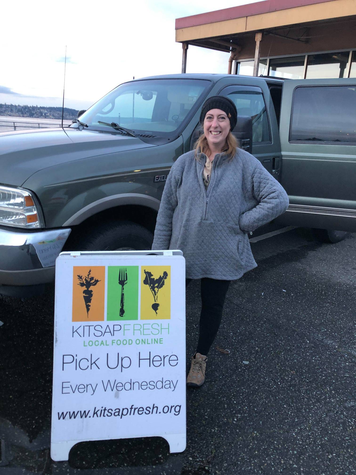 Elleni Mendoza poses at one of Kitsap Fresh's pickup locations in Poulsbo.(courtesy photo)