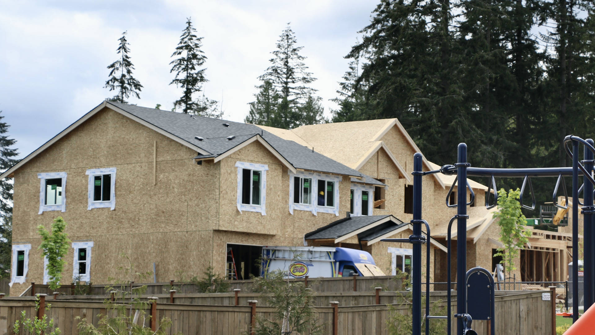 Two large single-family homes take shape in the new Poulsbo Meadows neighborhood. One of several housing developments that will be growing over the next 12-18 months. (KPark/NKH)