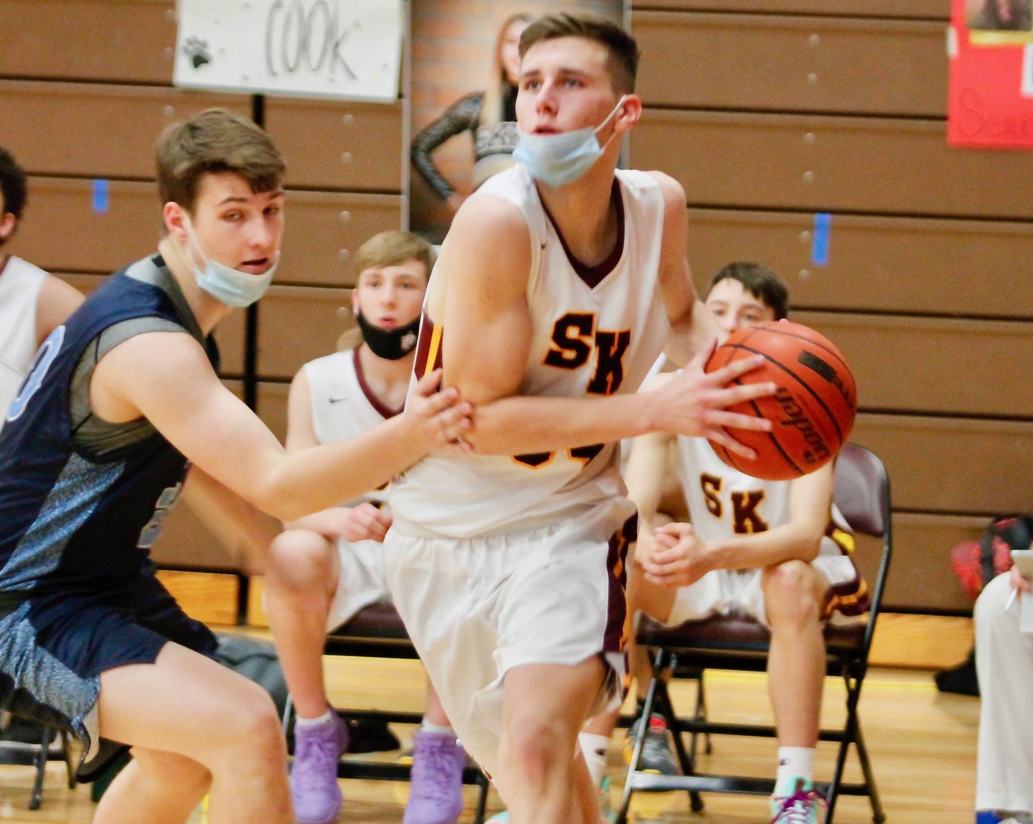 South Kitsap senior Rylan Zietlow dribbles past a Gig Harbor defender on his way to the basket. (Mark Krulish/Kitsap News Group)