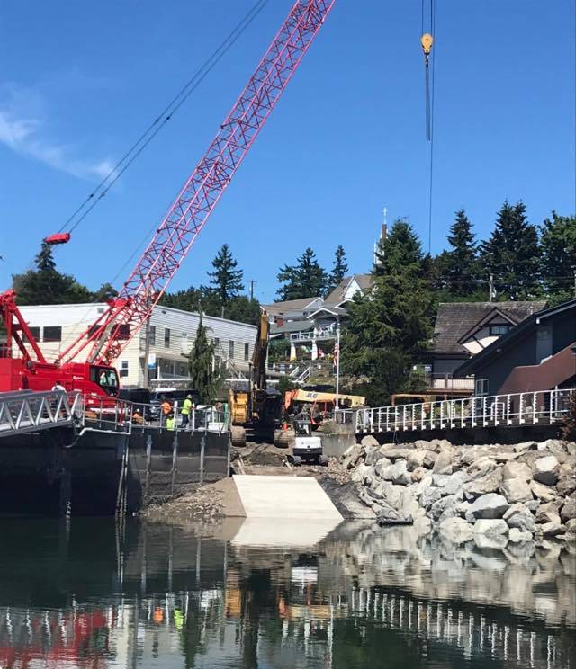 Cranes are often part of the Seattle skyline, but it seems one has crossed the water to be (temporarily) part of the Poulsbo skyline. (Courtesy Photo)