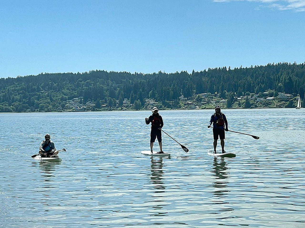 Chad Rounds, Jimmy Lee Burrus and Ryan Hough on the water at the completion of the Warrior Paddle. (Contributed photo)
