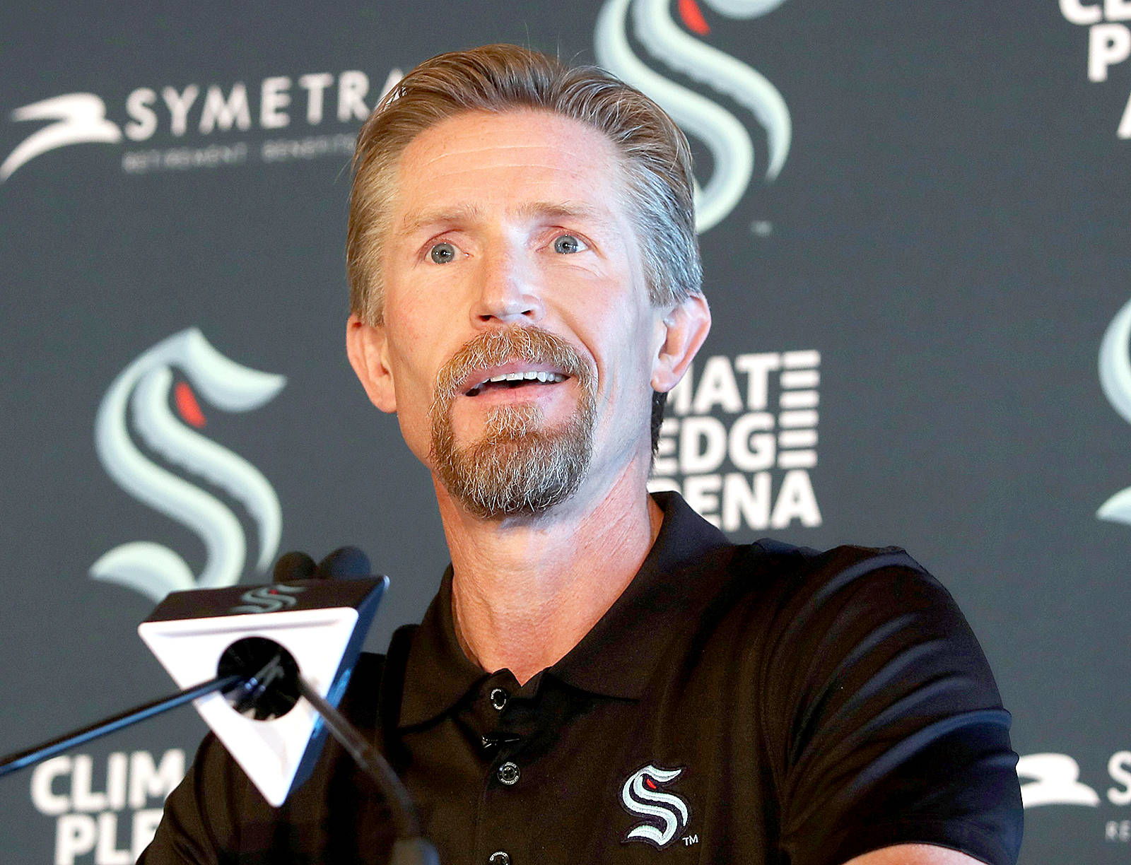 New Seattle Kraken head coach Dave Hakstol listens during a news conference June, 24 in Seattle. (Ken Lambert/The Seattle Times via AP)