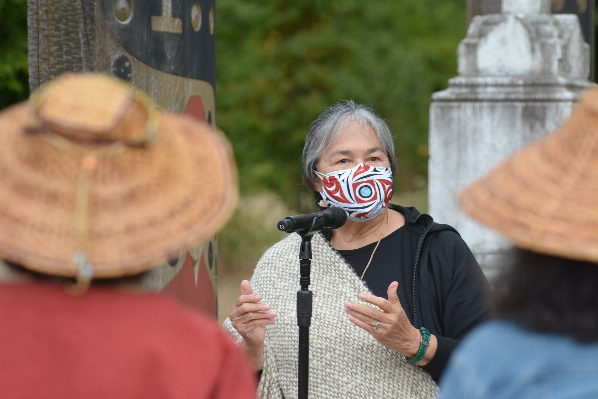 Suquamish Elder Marilyn Wandery presides over ceremonies at Chief Seattle’s gravesite in Suquamish at the opening Chief Seattle Days events on Saturday. (Photo by Jon Anderson/Courtesy of Suquamish Tribe)