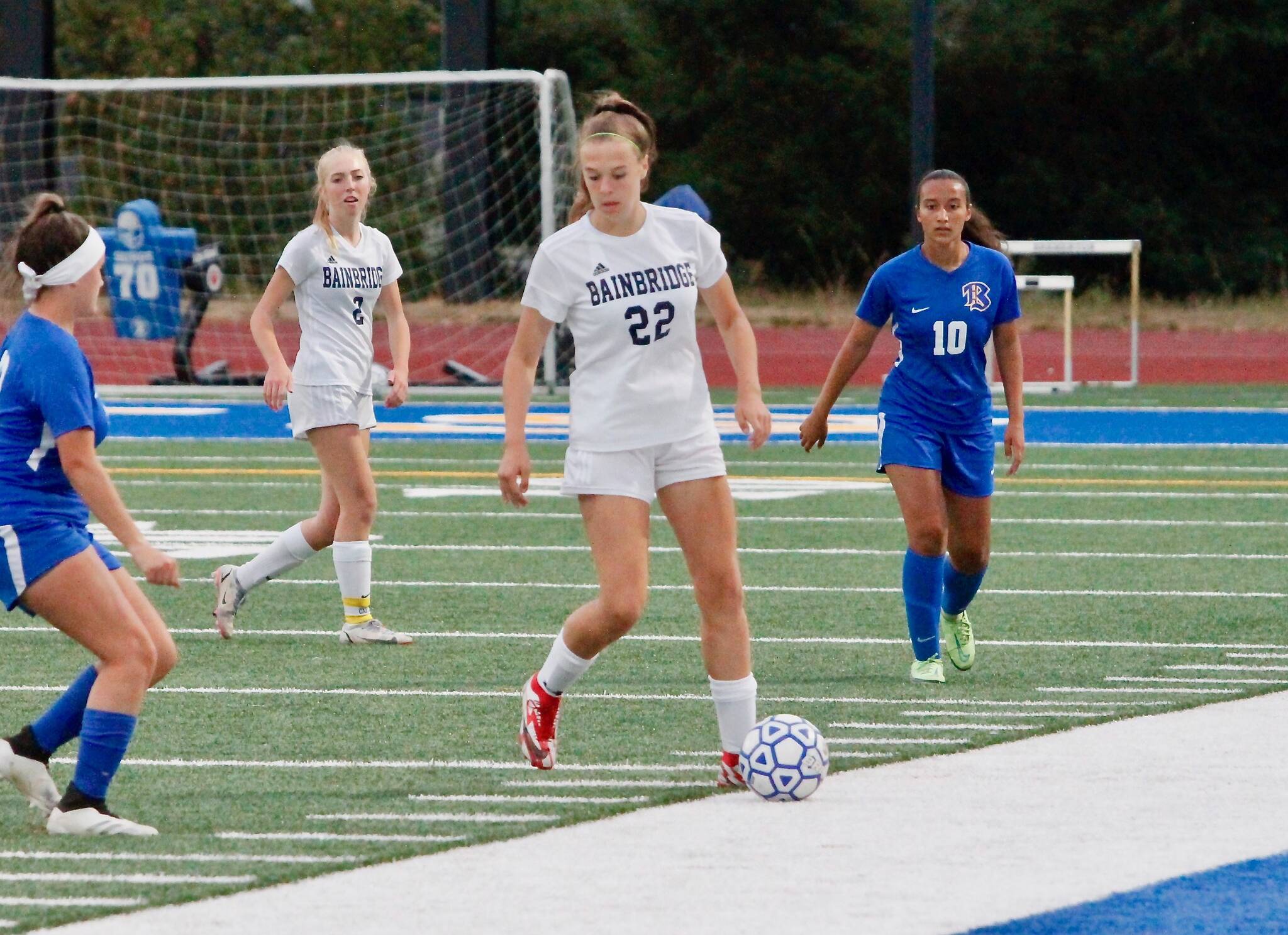 Junior midfielder Emily Fox keeps possession away from Bremerton. Fox scored the fifth and final goal of the game in the second half for Bainbridge.