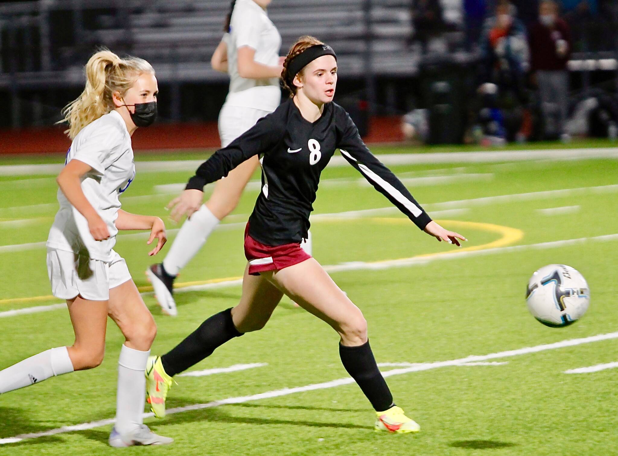 South Kitsap forward Maya Foster (8) chases down a loose ball in Tuesday night’s home-opener against Graham-Kapowsin. (Mark Krulish | Kitsap News Group) 
Mark Krulish | Kitsap News Group
South Kitsap forward Maya Foster (8) chases down a loose ball in Tuesday night’s home-opener against Graham-Kapowsin.