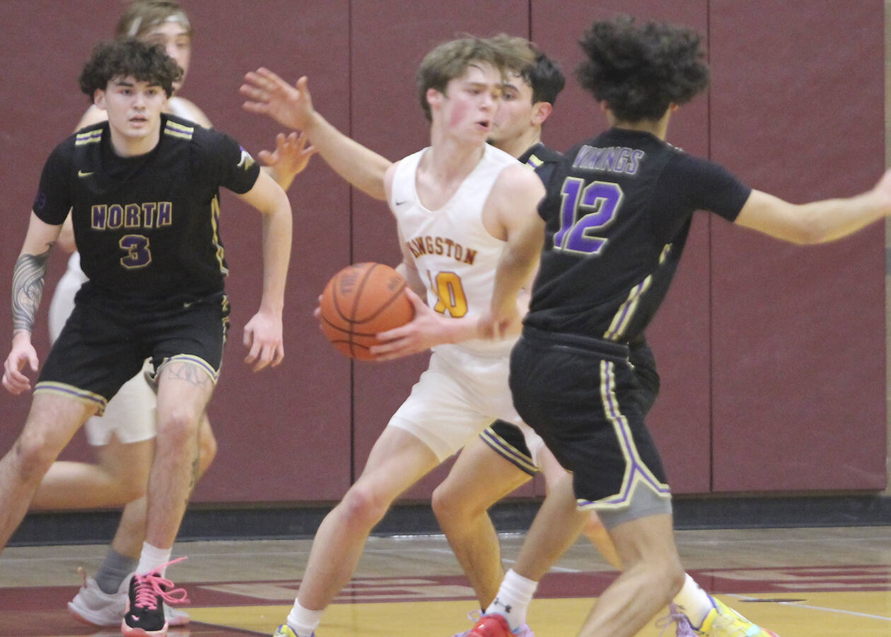 NK’s defense sets the stage for its high-scoring offense. Here, Aiden Olmstead (3), Harry Davies (12) and Colton Brewer put pressure on Kingston’s standout guard Zach Mead (10). Steve Powell/North Kitsap Herald photos