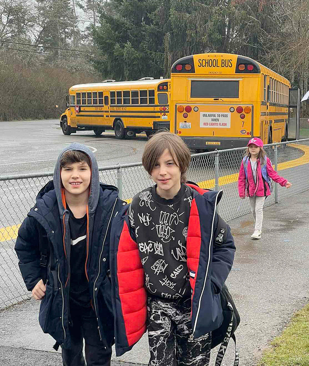 Dasha Kusherets’s boys outside South Colby Elementary in Port Orchard March 14 on their first day of school. (Courtesy of Daria Kusheret)
