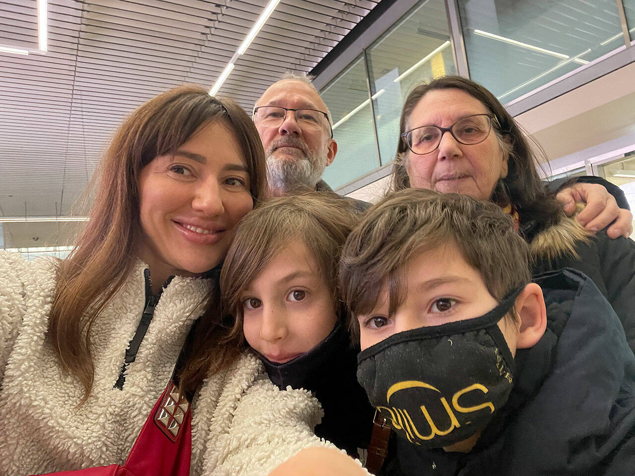 A French couple, longtime friends of Dasha Kusherets, drove Dasha and her boys to the international airport in Geneva, Switzerland, for their long flight to Seattle. (Courtesy of Daria Kusherets)