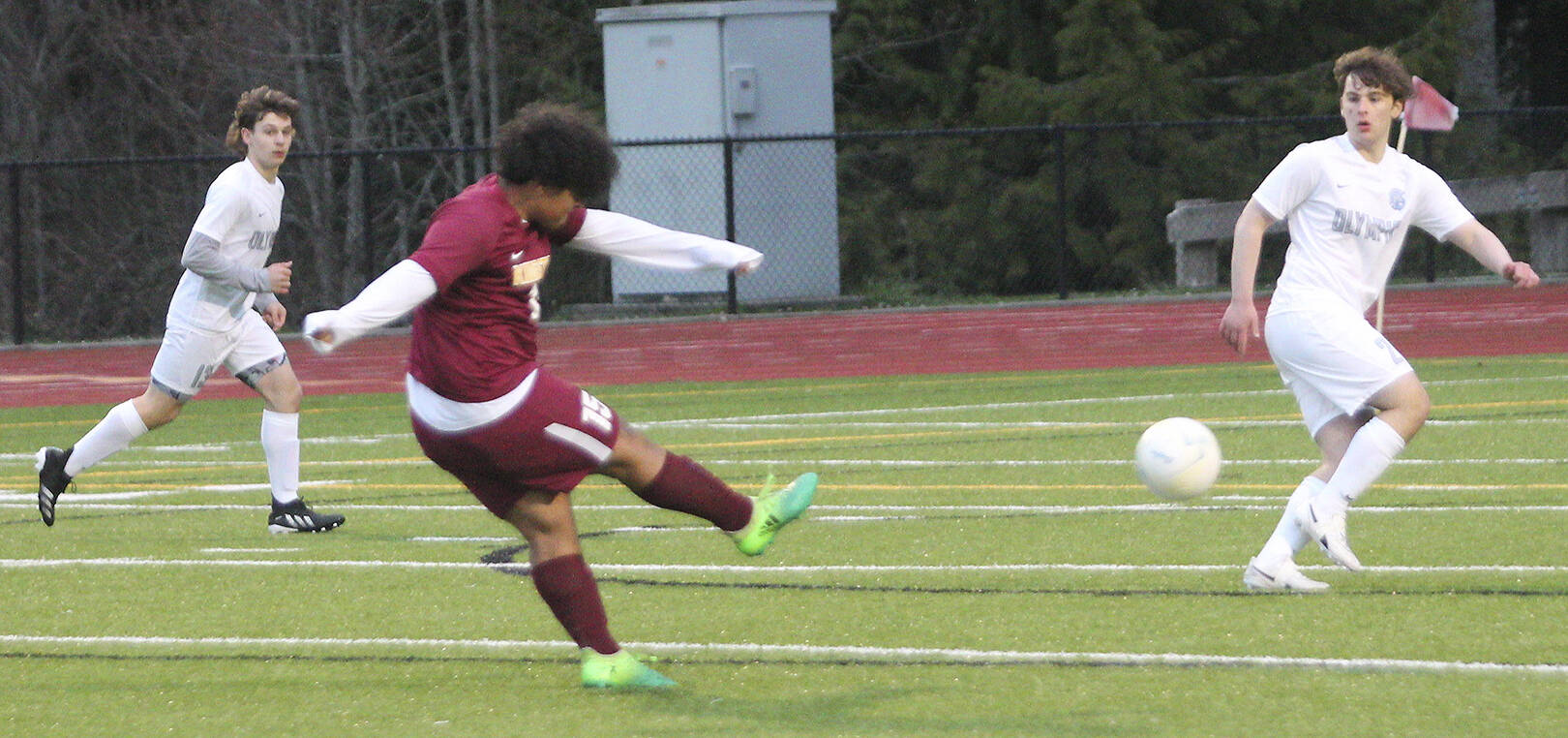 Anthony Garcia gets off a shot against Olympic for Kingston.